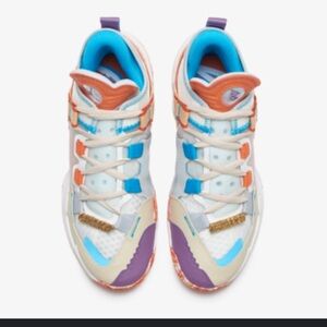 Jordan Sneakers with Vibrant Orange, Purple, and Blue